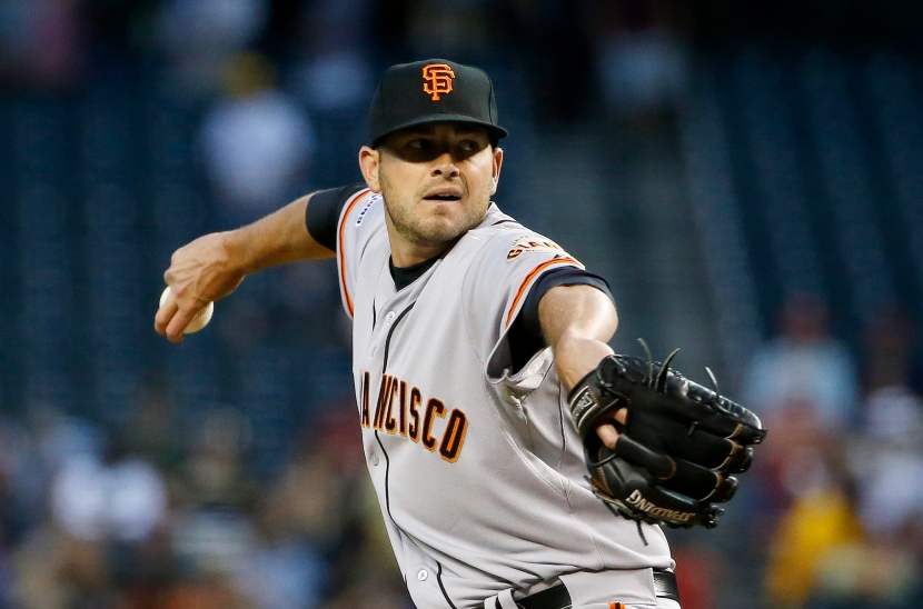 San Francisco Giants' Chris Heston throws a pitch against the Arizona Diamondbacks during the first inning of a baseball game Wednesday, April 8, 2015, in Phoenix. (AP Photo/Ross D. Franklin)